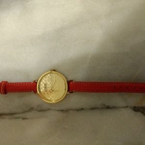 Coach orange leather band with gold face